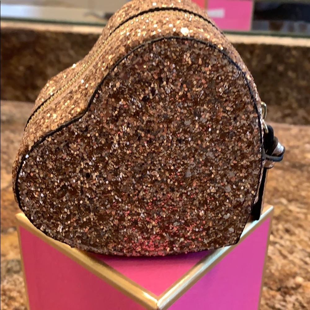 Rose gold glitter jewelry case.